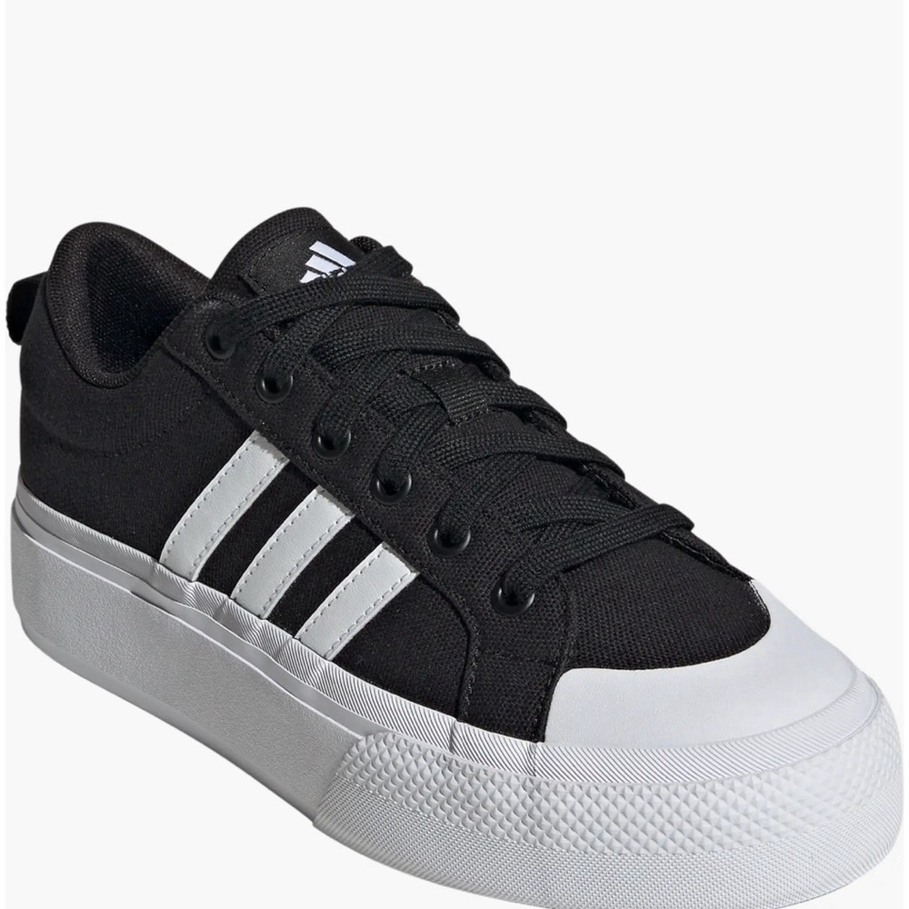 Adidas women’s platform Black and White Canvas Sneakers